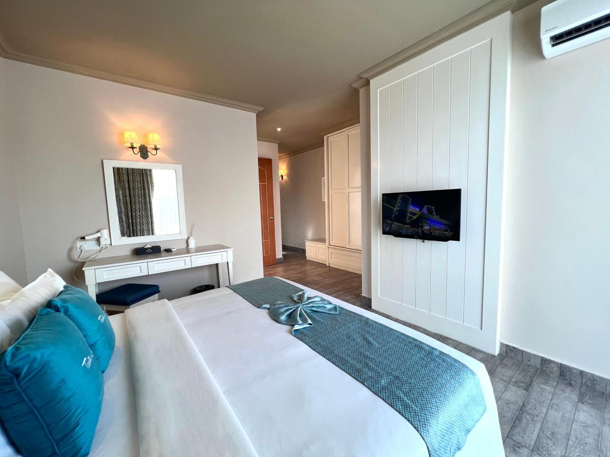 פורט דיקסון Tasik Villa International Resort מראה חיצוני תמונה A bedroom at the hotel