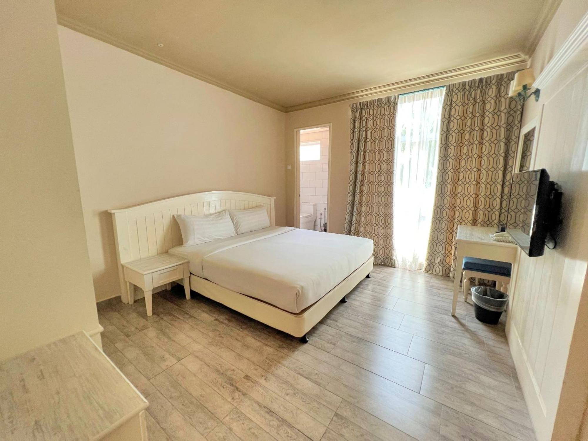 פורט דיקסון Tasik Villa International Resort מראה חיצוני תמונה A bedroom at the hotel